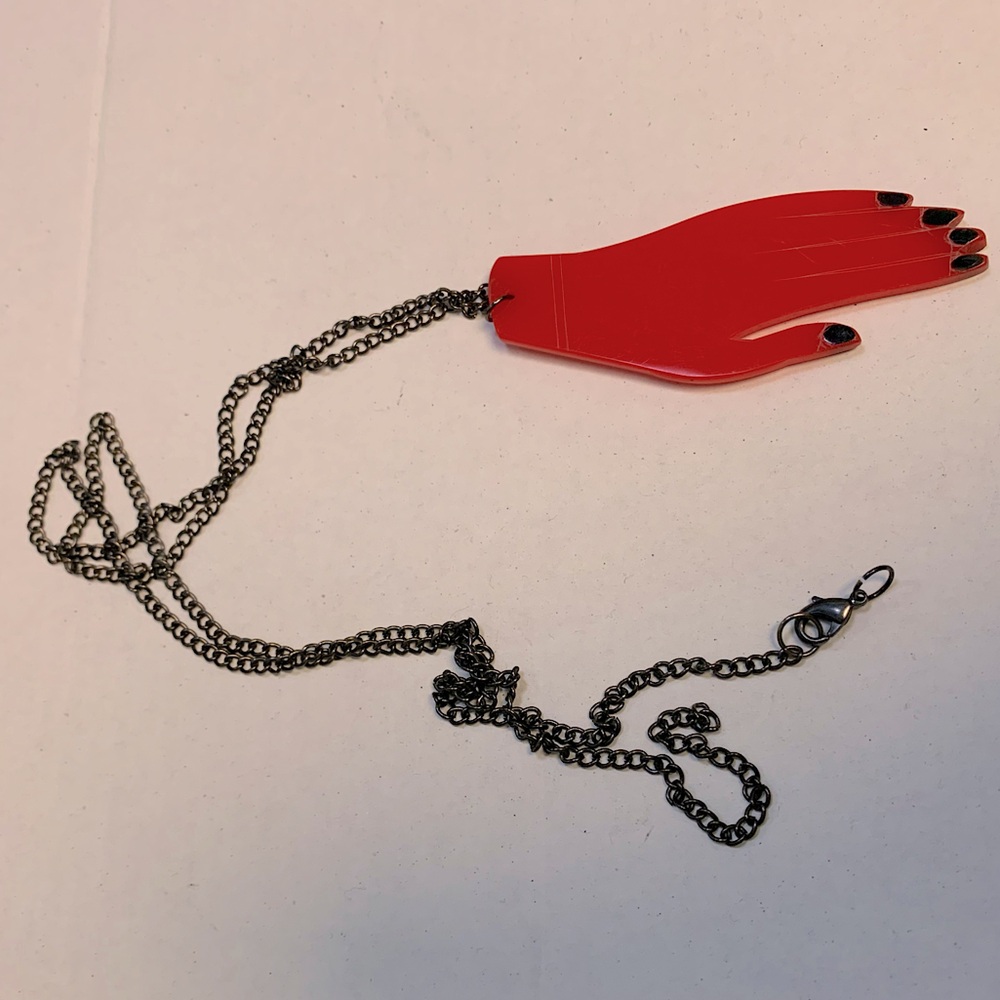Red Hand Pendant Necklace.